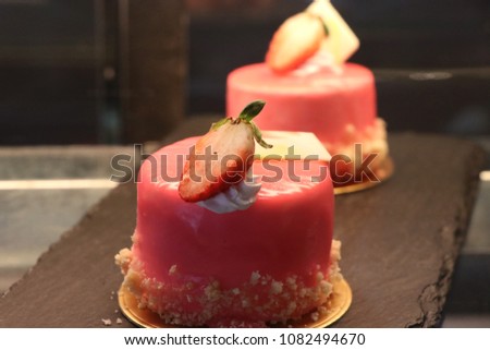 Strawberries candy cake beautiful color sweet food on shelf