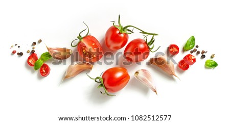 composition of tomatoes and spices isolated on white background, top view Royalty-Free Stock Photo #1082512577