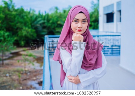 Portraiture of beautiful young Muslim Girl wearing hijab and Casual outfit.