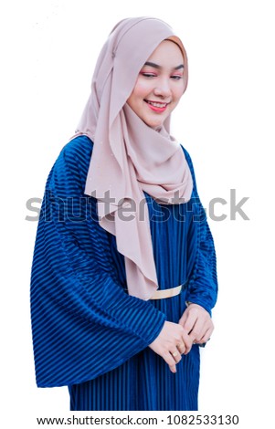 portrait of beautiful young woman wearing hijab