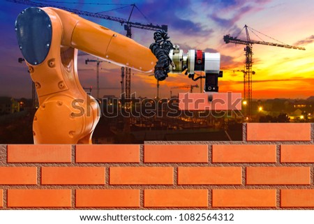 Bricklayer robot working for building brick wall in construction site in sunset sky.concept of robotic technologies in construction industry. 
