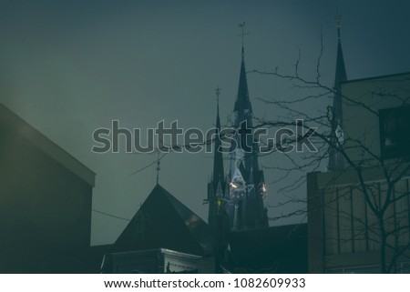 Dark church towers in the night