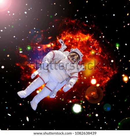 Astronaut, starfield and deep space. The elements of this image furnished by NASA.