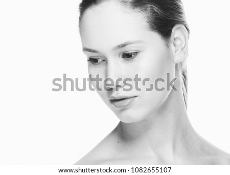 Monochrome beauty girl face close up isolated on white healthy skin