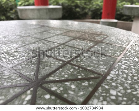 In the public park in Hong Kong, there are usually some chess board printed on the stone table. Residents nearby bring along their chess and spend the whole afternoon there playing chess games.