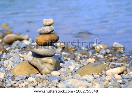 Zen balance of stones on the river