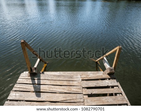 footbridge for swimming on the lake

