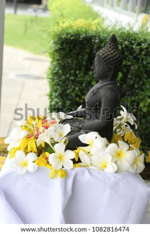 Black Buddha statue.