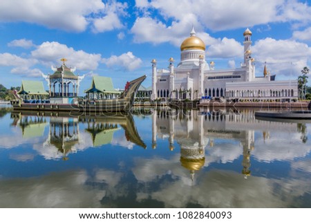 Omar Ali Saifuddien Mosque and a replica of a royal barge in Bandar Seri Begawan, Brunei Royalty-Free Stock Photo #1082840093