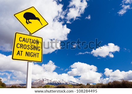 New Zealand Road Sign Attention Kiwi Crossing at road near active volcano of Mount Ruapehu in Tongariro National Park