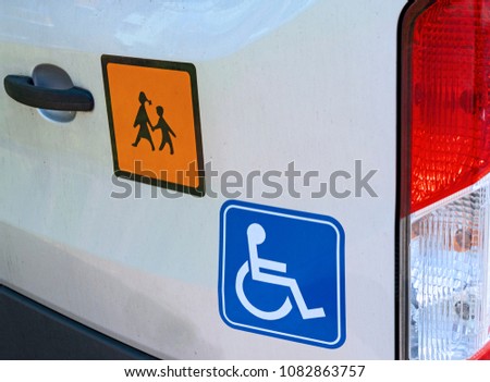 Close-up of signs on a school bus for handicapped children in Germany