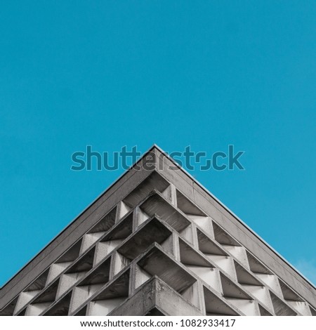 Symmetrical image of brutalist building in Cologne, Germany. Royalty-Free Stock Photo #1082933417