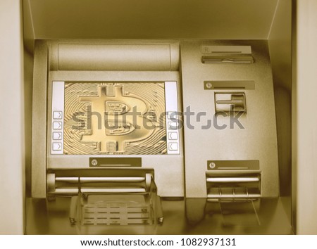 Street Bitcoin ATM teller machine with current operation. The concept of using digital currency