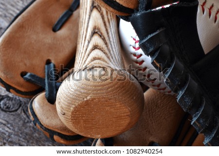 A close up image of old baseball equipment.