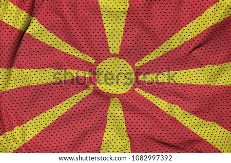 Macedonia flag printed on a polyester nylon sportswear mesh fabric with some folds