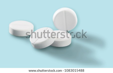 White pills on desk