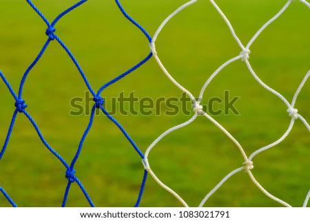 close up rope net fence on field in outdoor sport game for background.
