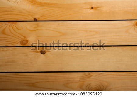 Horizontal brown wooden planks wall texture background.