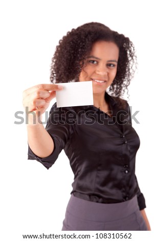 Businesswoman showing greeting card - selective focus on hand