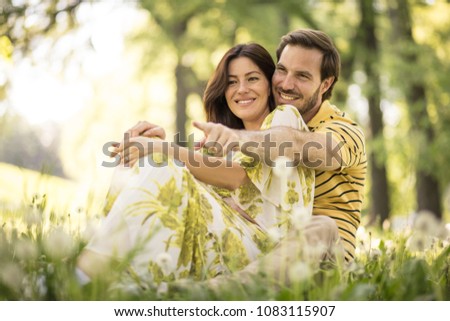 Portrait of middle age couple at nature. Spring season. 