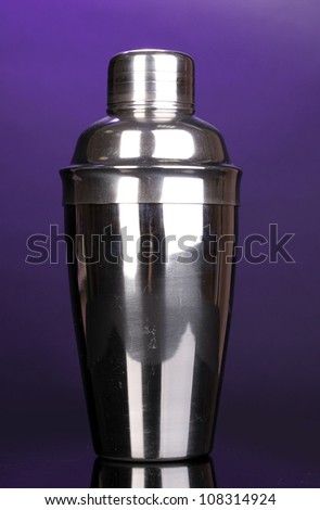 Cocktail shaker on violet background