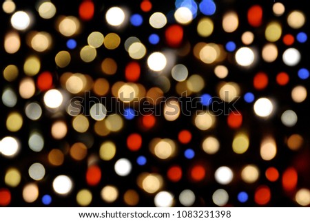 Defocused blurry light in dark night and create in seamless style from my picture, colorful various size of polka dot shaped in vintage on negative background, wallpaper or card or pattern concept