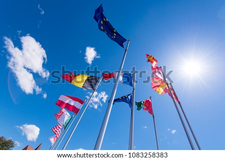 Rows of European flags and flags of the World countries 