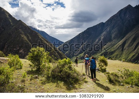 Tourists hiking the Inca Classic Trail in Peru. Royalty-Free Stock Photo #1083291920