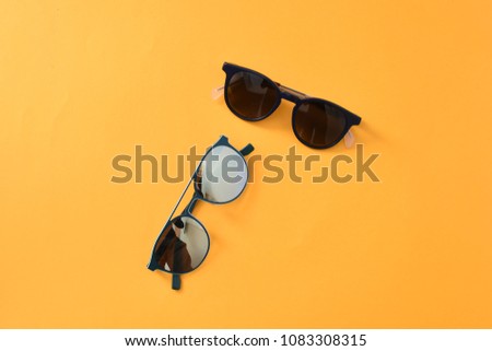 sunglasses eyewear on pastel color paper background