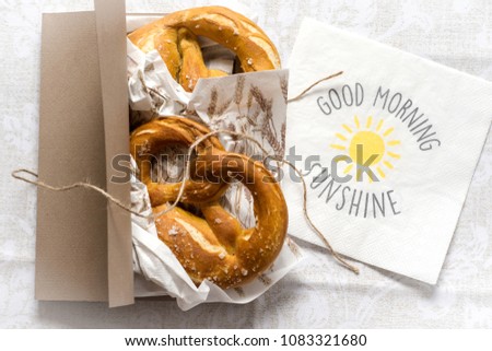 Good Morning Sunshine Background. Pretzels in a Box for Breakfast.