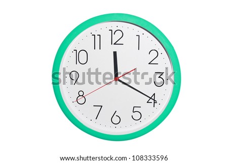 isolated green clock on a wall