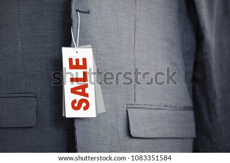 Sale label on new suit jacket close-up