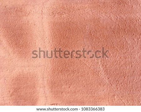 Orange cement wall background 