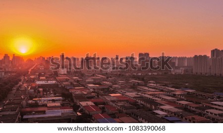 September 4, 2014: Luannan County town under sunset, Luannan County, Hebei Province, China.

