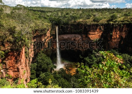 Amazingly beautiful Veu de Noiva waterfall in Chapada dos Guimaraes national park,Brazil Royalty-Free Stock Photo #1083391439