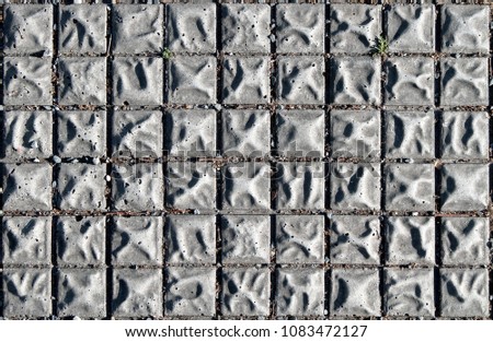 Grey pavement tiles texture. Prague. Czech Republic.