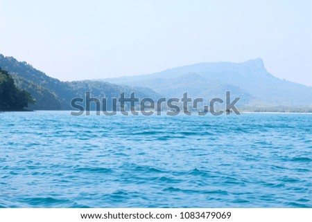 Sea and mountain look like dolphins at krabi province of Thailand. Select focus.