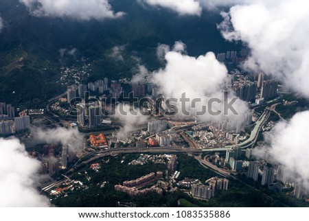 Hong Kong from the top view, Below are the tall buildings and houses of the people in the country.