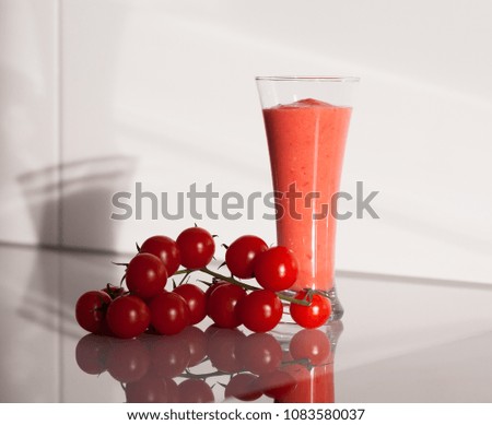 Beautiful appetizer strawberry vegetable smoothie in glass. Close up. Natural detox diet. Healthy eating nutrition. White background kitchen.