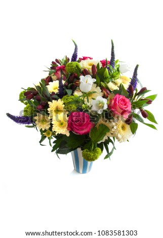 Beautiful colorful bouquet with mixed flowers isolated over white