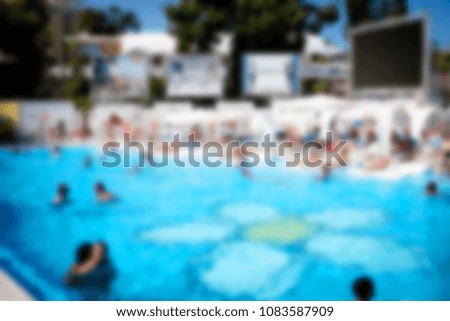 blurred for background Interrior of Elite comfortable beach pool resort with palm trees and pools.  restaurant beach club highest level at resort for a holiday in beach season.