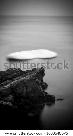 long exposure picture of small iceberg near St John's, Newfounland
