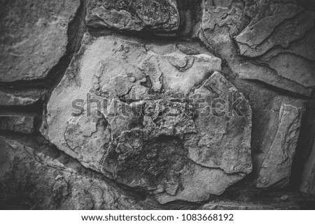 Close up of natural stone wall. Stone wall texture.
