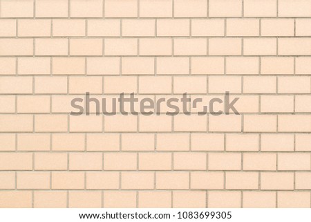 Vintage brown brick wall seamless background and texture