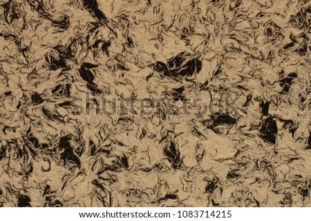 beige-black textured wall