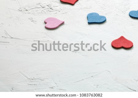 group of multi-colored hearts on white hand drawn background. Close-up