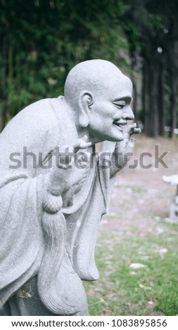 Buddhist Statue Smiling