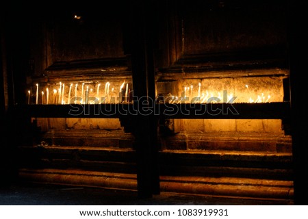 Candles in the Church of the Holy Sepulchre in Jerusalem