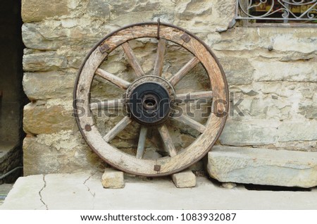 Wooden rustic wheel - Abstract concept: rural style, retro, vintage