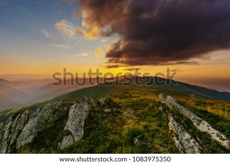 Beautiful summer sunset in Carpathian mountains,dramatic sky clouds and warm evening on mountains range